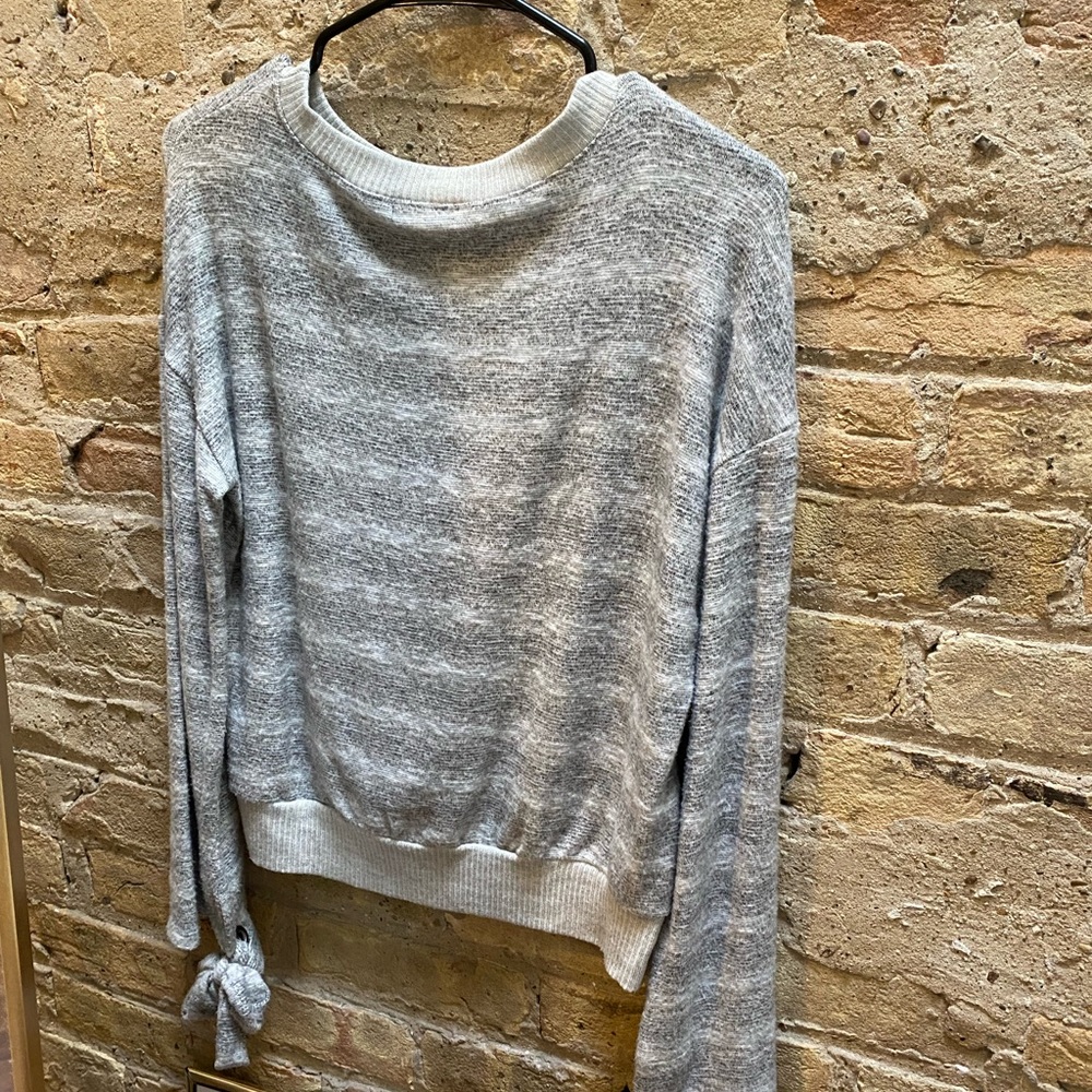 Grey sweater with wrist detail